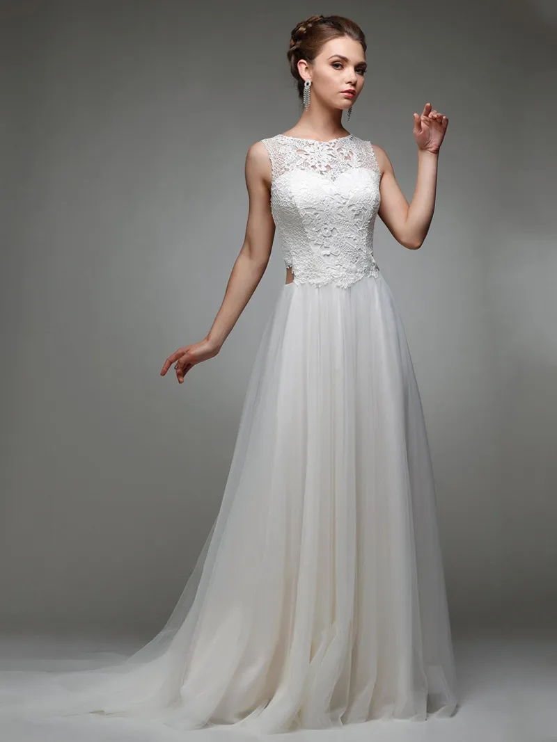Abito sposa effetto due in uno gonna sfumata in tulle e corpetto in macramè