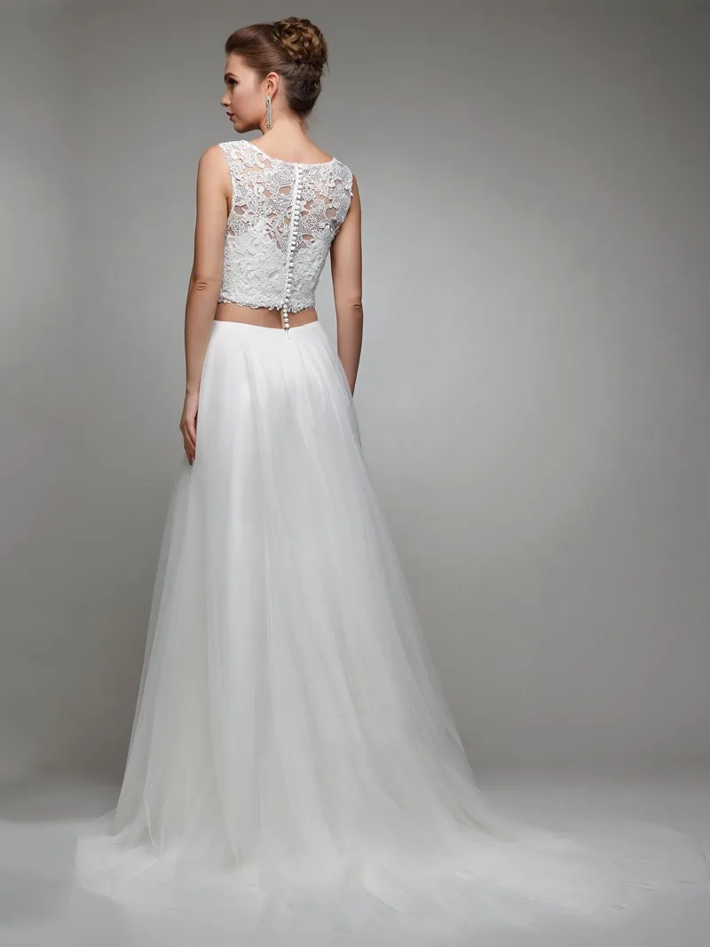 Abito sposa effetto due in uno gonna sfumata in tulle e corpetto in macramè