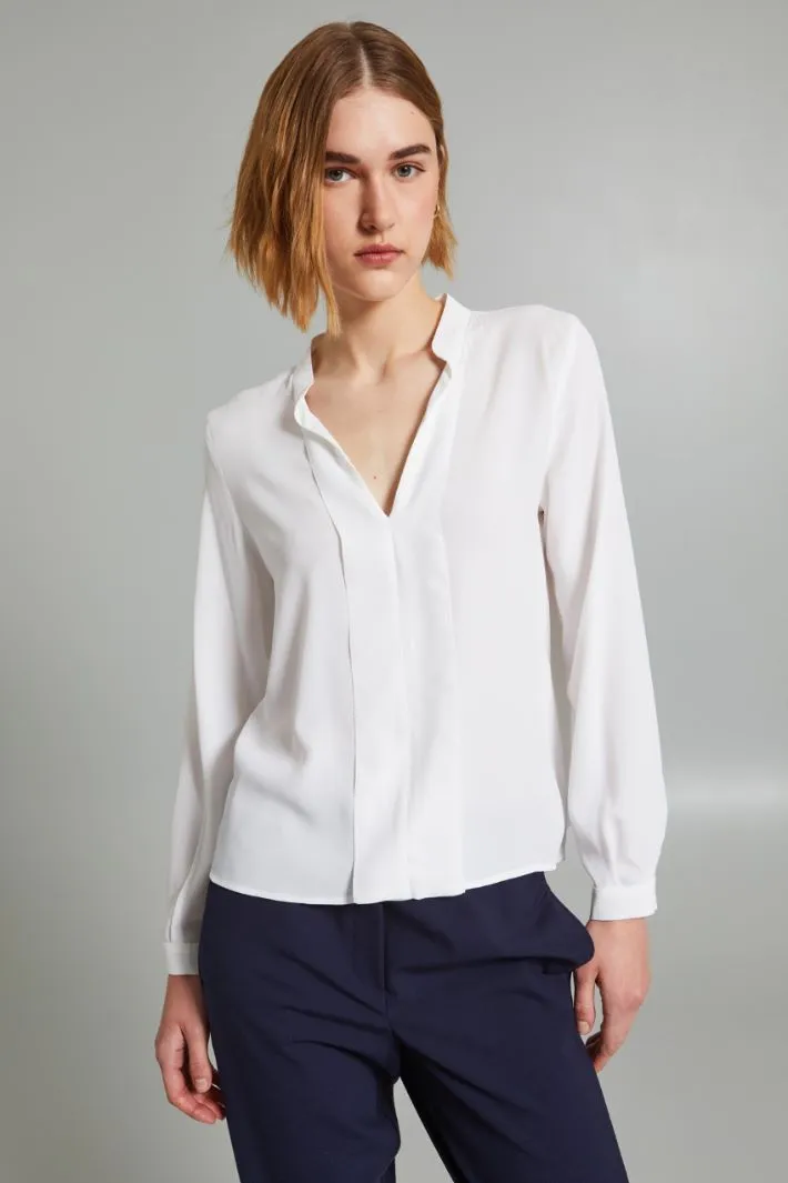 Blusa con scollo a V