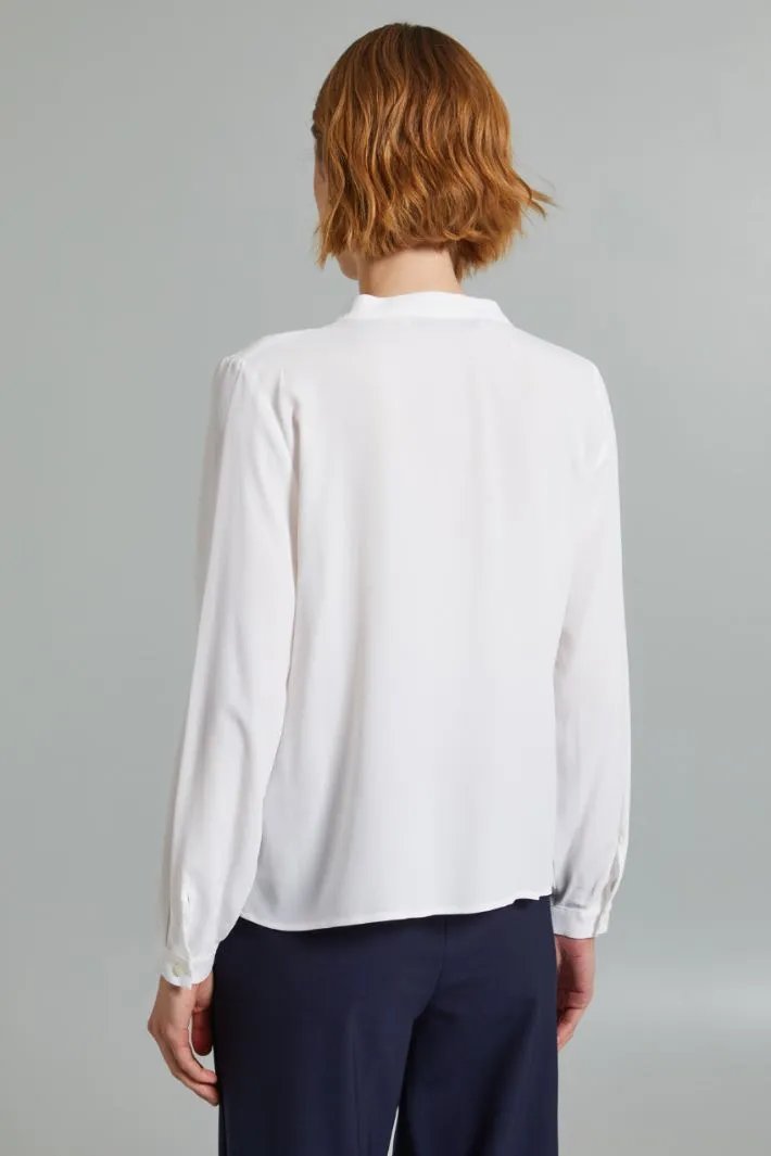 Blusa con scollo a V