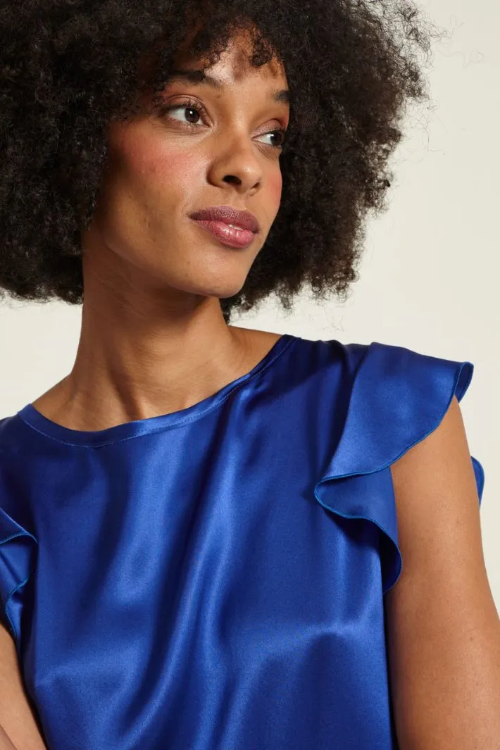 Blusa in raso con spacchi