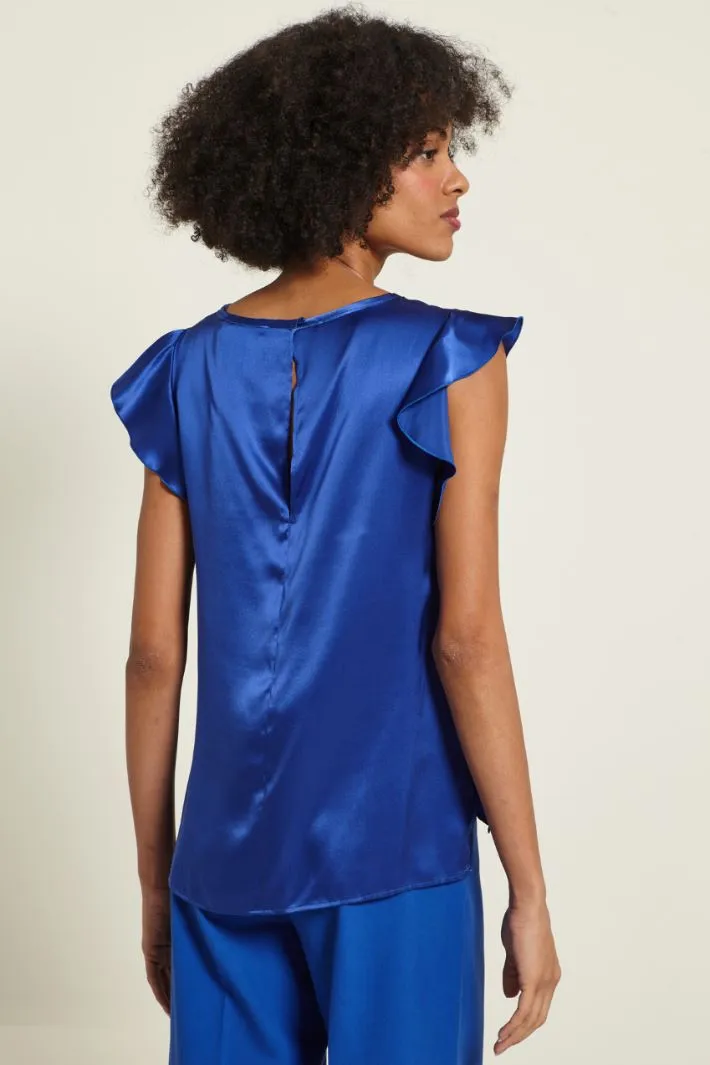 Blusa in raso con spacchi