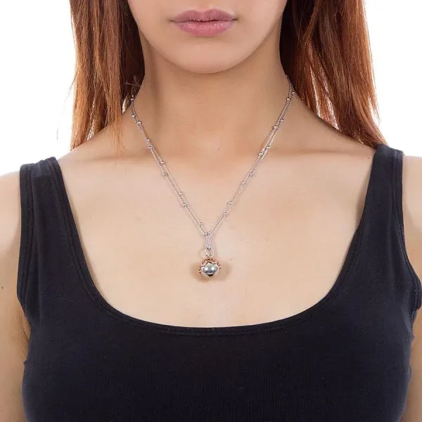 Collana con ciondolo sonoro bicolor, stelle e zirconi    