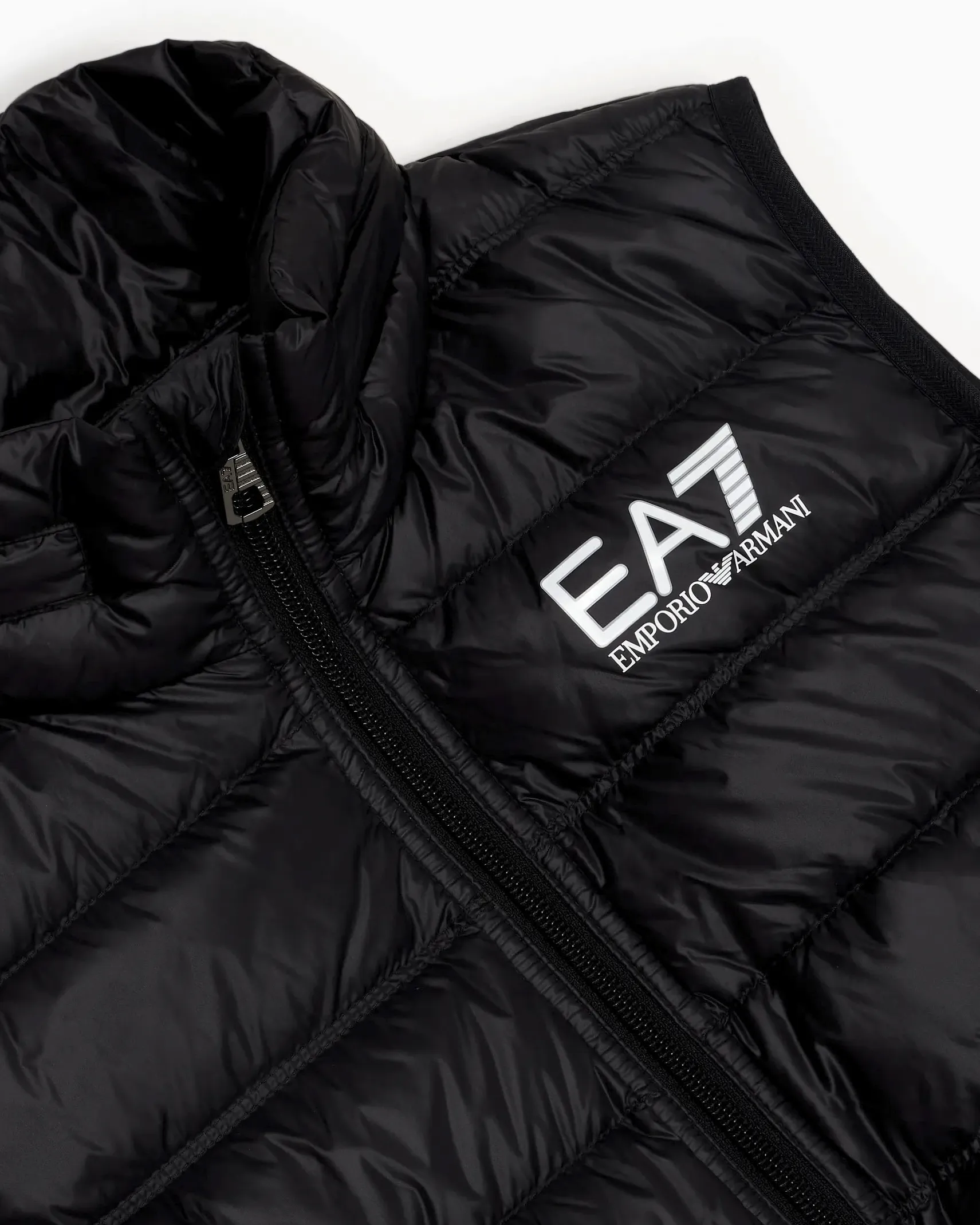 Gilet nero in nylon leggero imbottito in piuma 10-16 anni