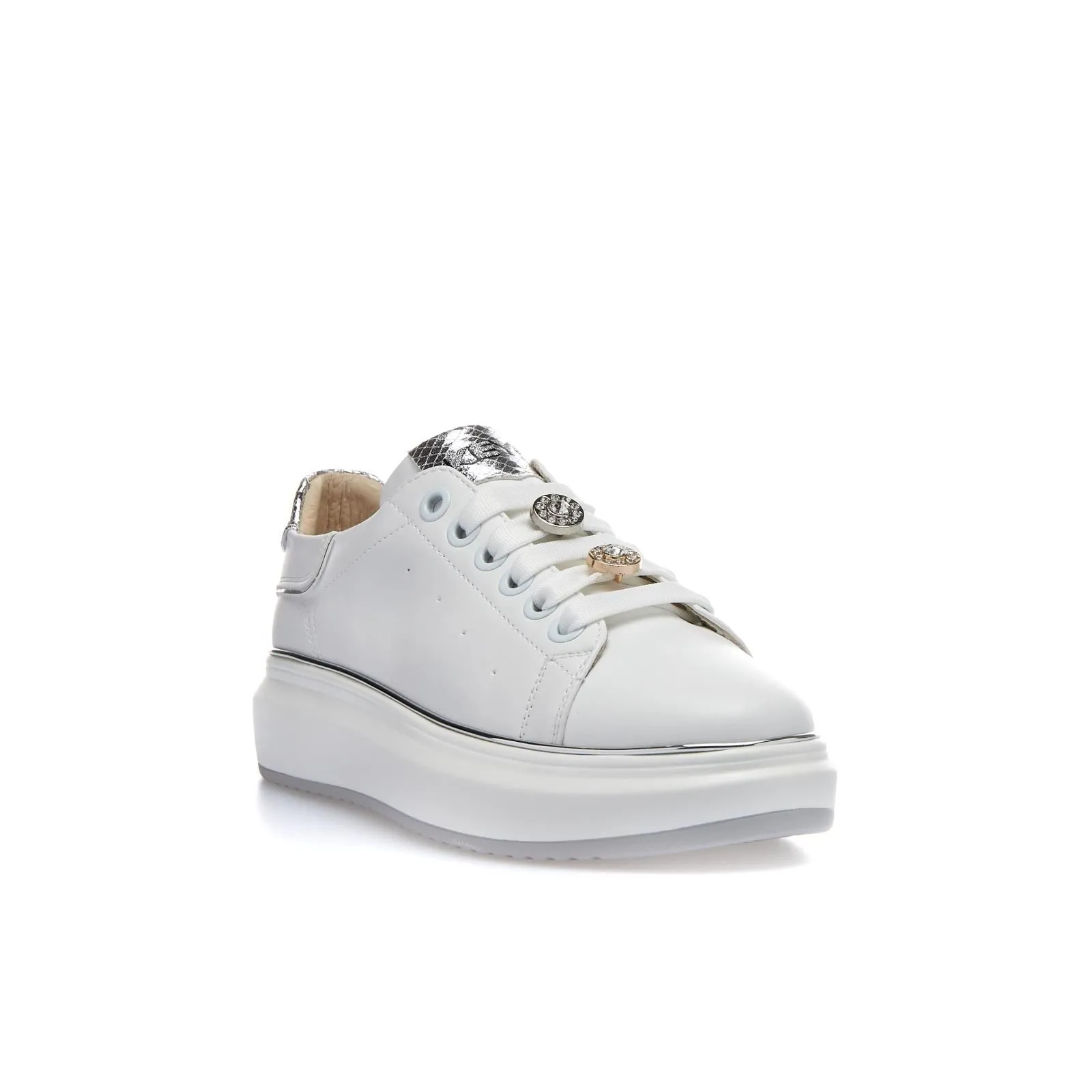 Sneakers bianche con applicazioni e suola platform