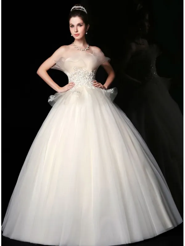 Vestito da Sposa principesco con gonna semplice in tulle e corpetto lavorato